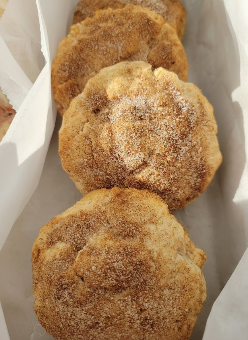 Cinnamon scones on a white surface